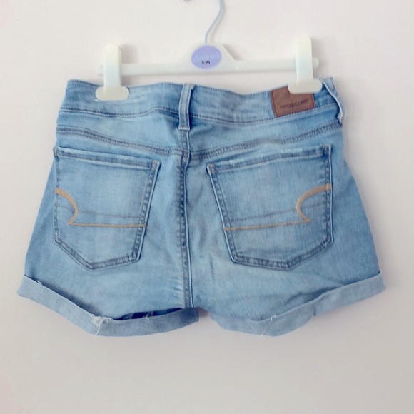 AE super stretch midi light denim shorts. - Picture 2 of 3
